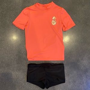 Girls hot pink pineapple swimmer t-shirt w/ Black swimmer shorts Cat and Jack